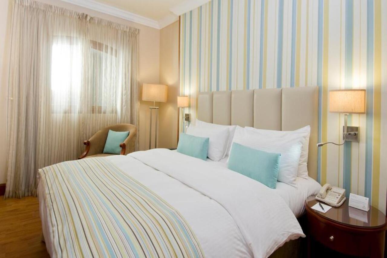 دانات منتجع العين المظهر الخارجي الصورة A bedroom