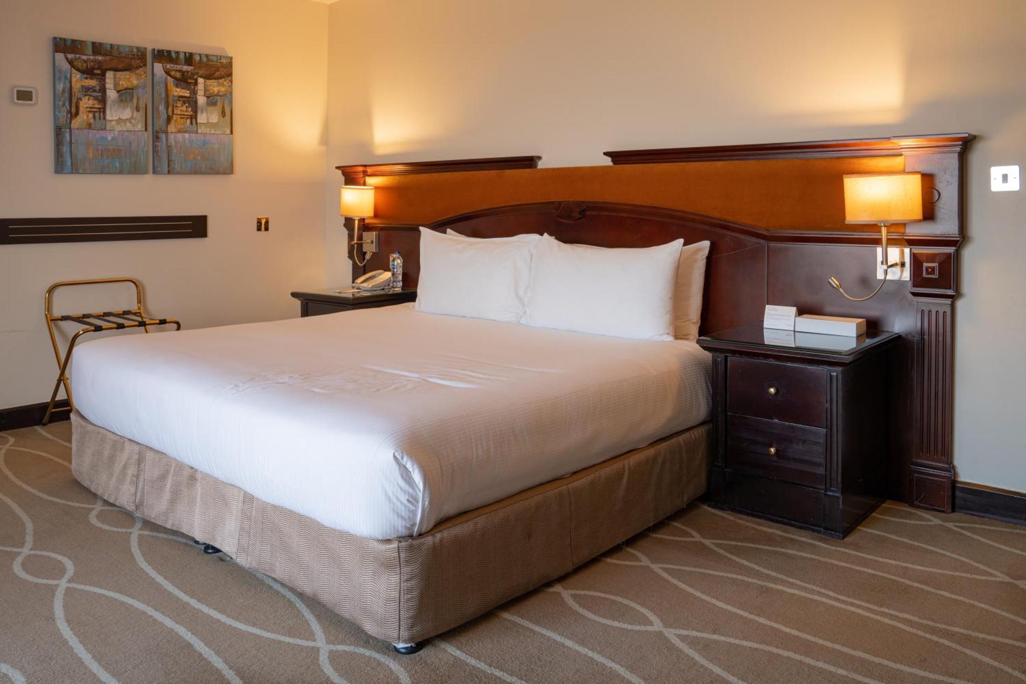 دانات منتجع العين المظهر الخارجي الصورة A bedroom at the hotel