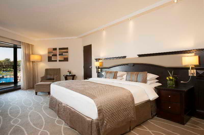 دانات منتجع العين المظهر الخارجي الصورة A bedroom at the hotel
