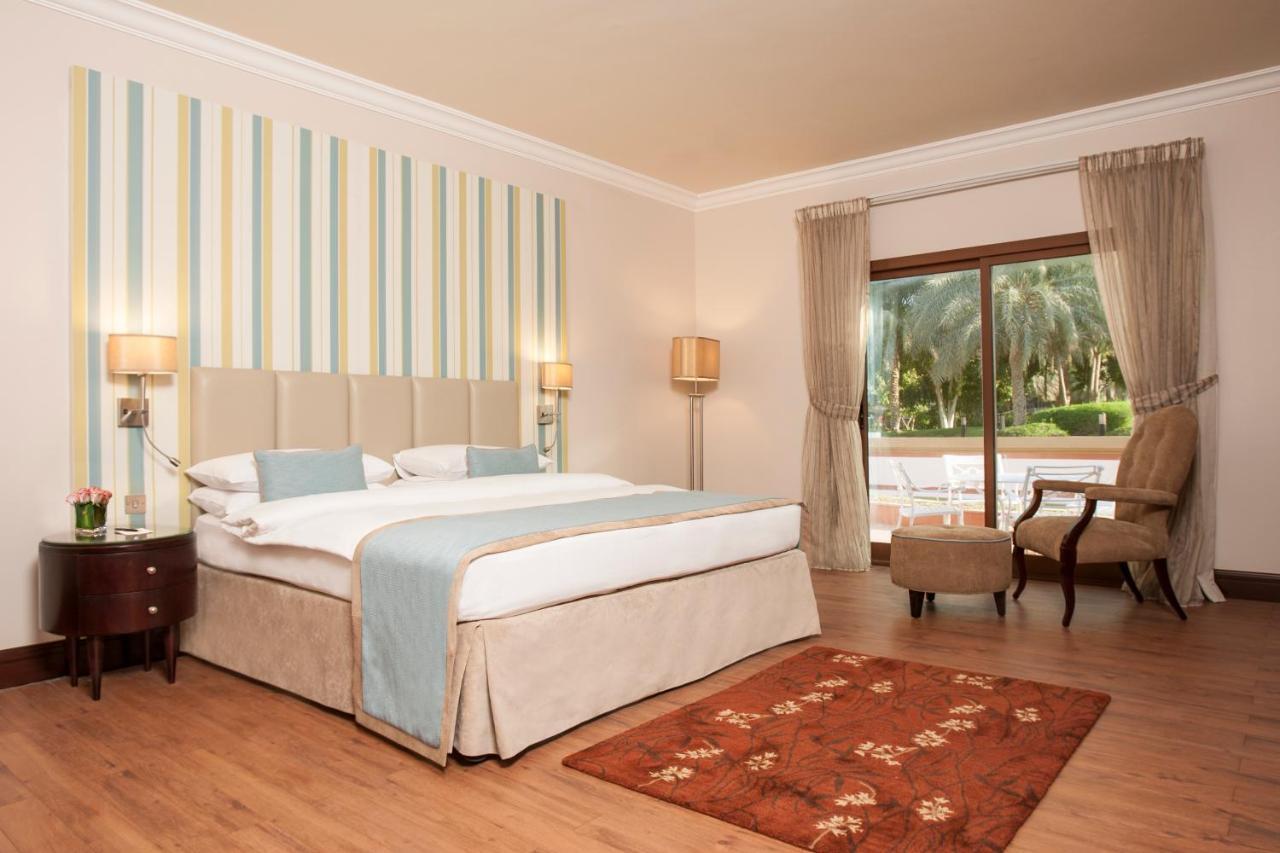 دانات منتجع العين المظهر الخارجي الصورة A bedroom at the hotel